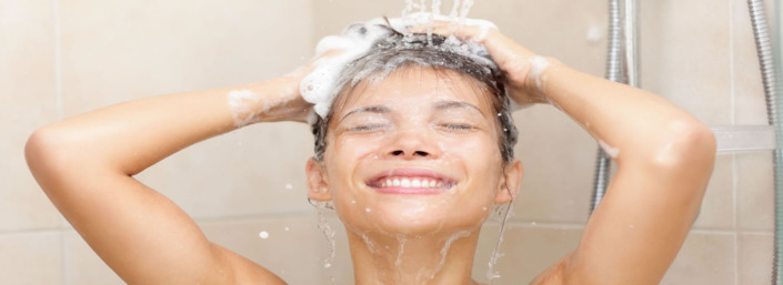 woman-shower-hot-water-installtion-central-coast